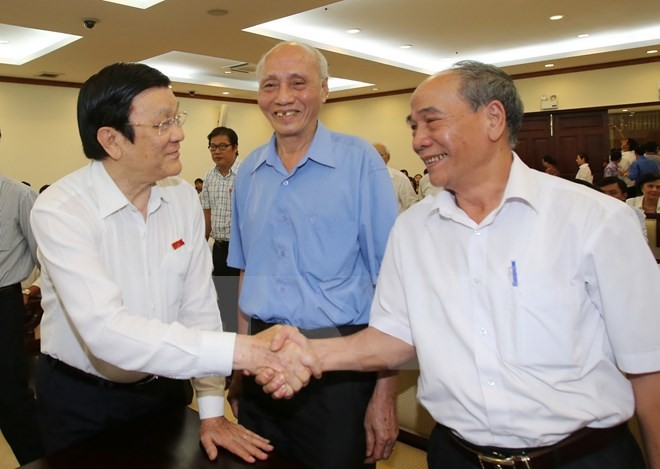 President Truong Tan Sang meets HCMC voters  - ảnh 1